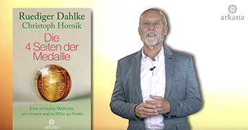 Dr. Ruediger Dahlke mit seinem Buch "Die 4 Seiten der Medaille"